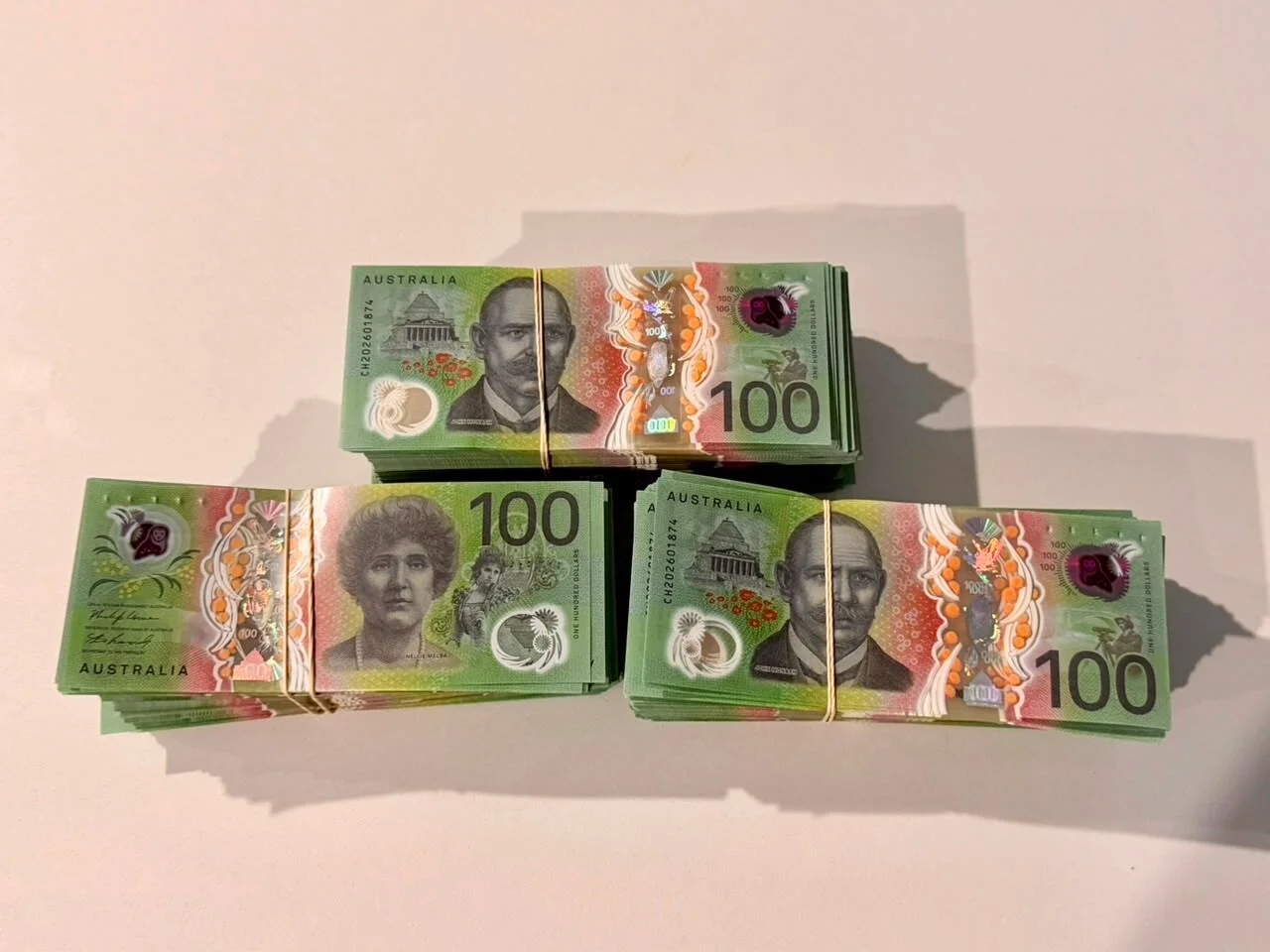 Stacks of $100 notes