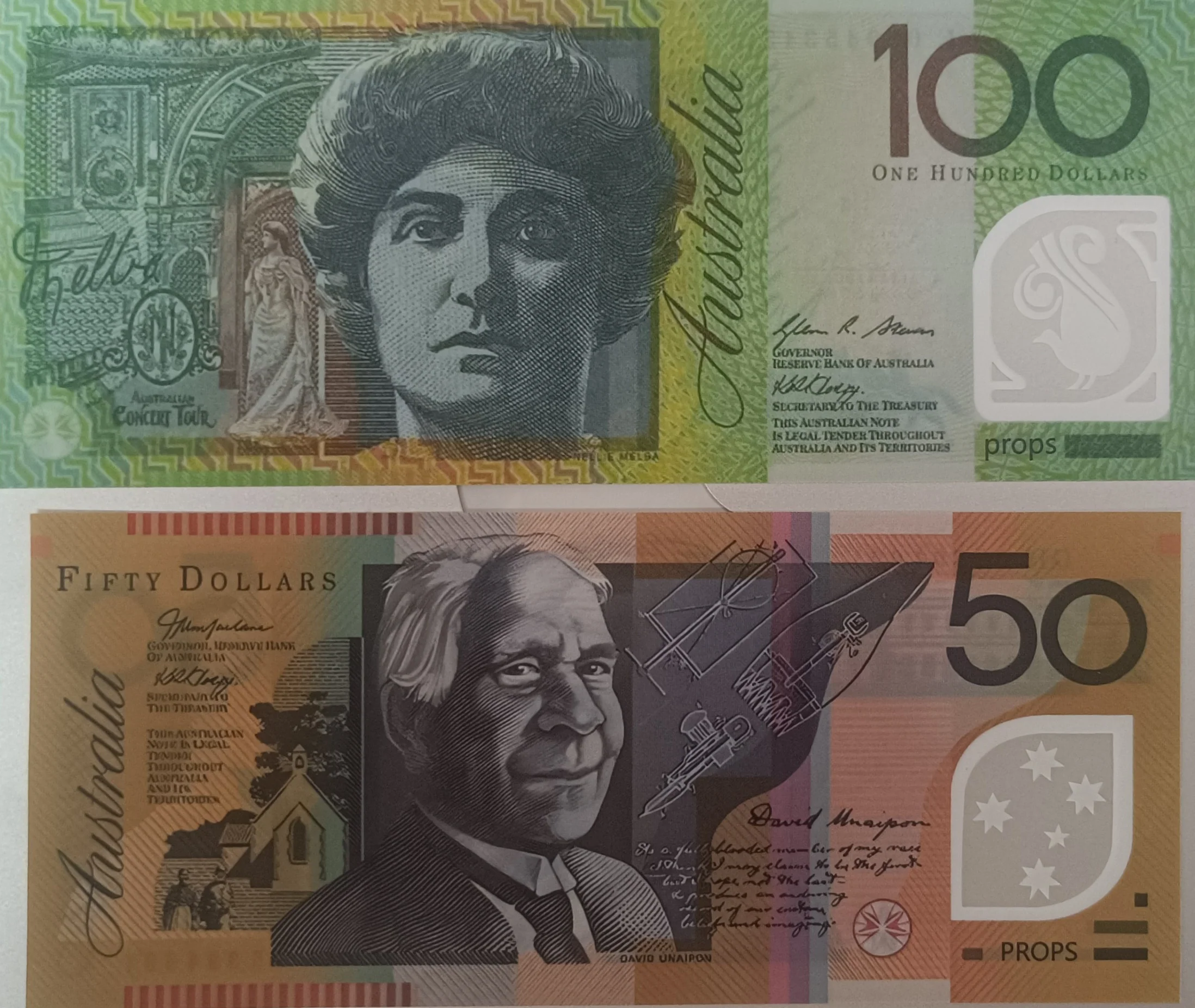 Close-up of Australian $100 and $50 prop notes with PROPS markings