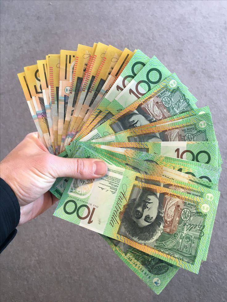Hand-held fan of Australian $100 and $50 prop notes