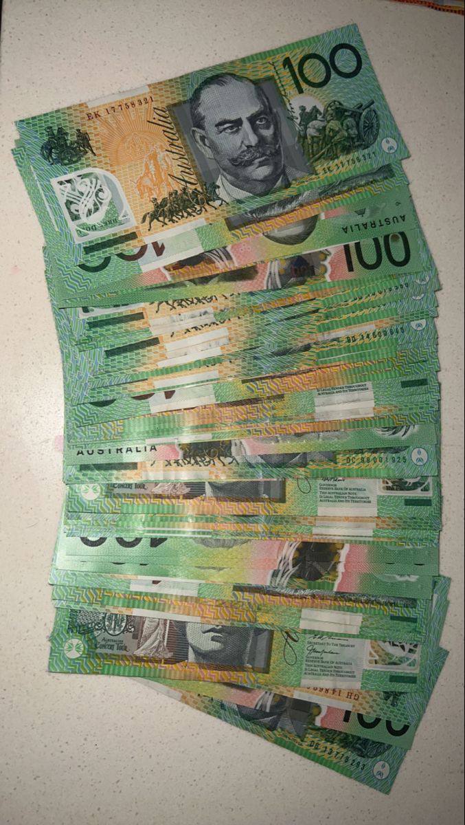 Loose stack of Australian $100 prop notes